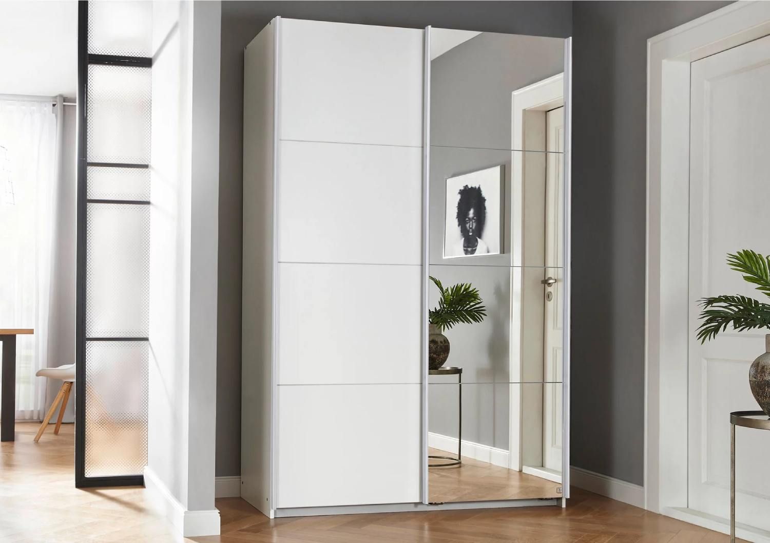 Oakwood Rauch Luma 136cm 2 Door Sliding Wardrobe with 1 Decor Door and 1 Mirror Door